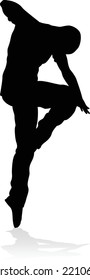 A male street dance hip hop dancer in silhouette