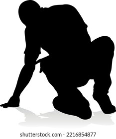 A male street dance hip hop dancer in silhouette