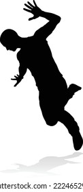 A male street dance hip hop dancer in silhouette