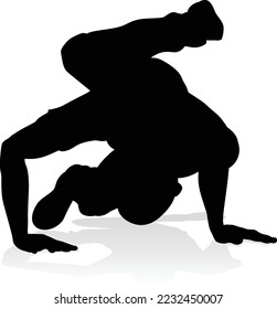 A male street dance hip hop dancer in silhouette