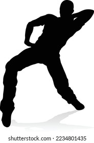 A male street dance hip hop dancer in silhouette