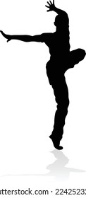A male street dance hip hop dancer in silhouette