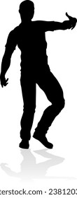 A male street dance hip hop dancer in silhouette