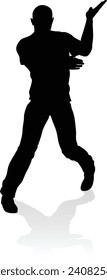 A male street dance hip hop dancer in silhouette