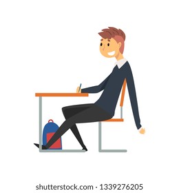 Male Student Sitting and Writing at Desk in Classroom, Side View, Schoolboy in Uniform Studying at School, College Vector Illustration