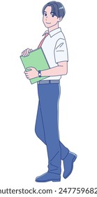 Male student smiling while holding a book