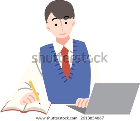 A male student studying while looking at a laptop.