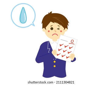 Male student with test answer sheet.