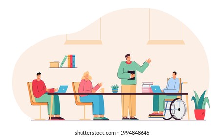 Male student in wheelchair attending lesson at school. Group of people having conversation, working together. Teacher standing and explaining new material. Inclusion, meeting, education concept