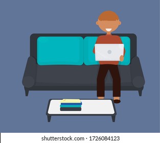 A male studying from home using online course while sitting on the sofa