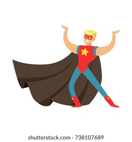 Male superhero in cape posing and showing muscles