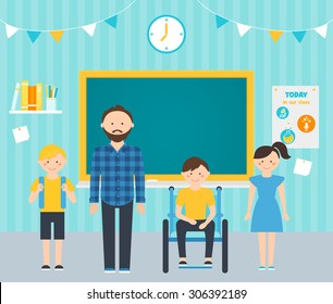 Male Teacher With Young Students In Classroom. Including Students With Special Needs Concept