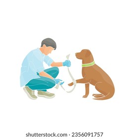 male veterinarian tying a dog's paw
