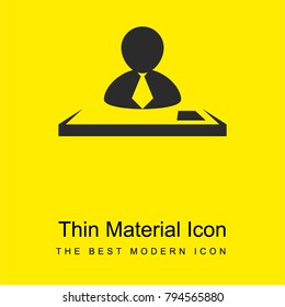 Male worker behind a desk bright yellow material minimal icon or logo design