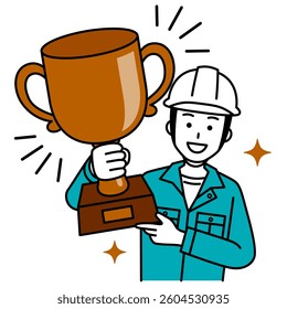 Male worker in a helmet holding a bronze trophy