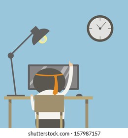 Male worker sat at his desk with computer.