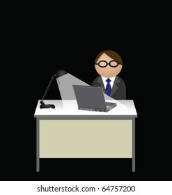 Male worker working late at the office