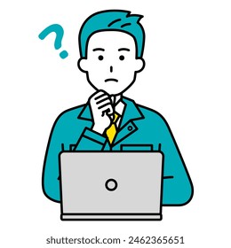 A male worker working on a laptop thinking of ideas