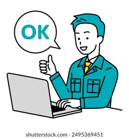 Male worker working on a laptop making an OK sign