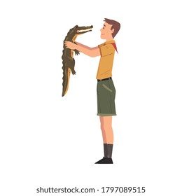 Male Zoo Worker holding Little Crocodile, Veterinarian or Professional Zookeeper Character Caring of Wild Animals in Zoo Cartoon Vector Illustration