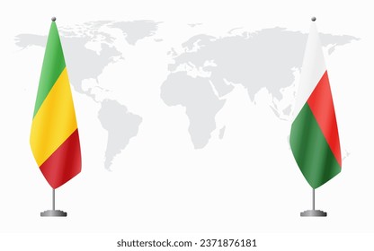 Mali and Madagascar flags for official meeting against background of world map.