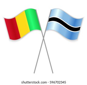 Malian and Motswana crossed flags. Mali combined with Botswana isolated on white. Language learning, international business or travel concept.
