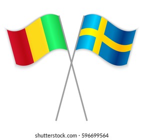 Malian and Swedish crossed flags. Mali combined with Sweden isolated on white. Language learning, international business or travel concept.