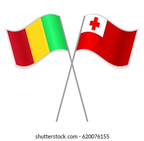 Malian and Tongan crossed flags. Mali combined with Tonga isolated on white. Language learning, international business or travel concept.