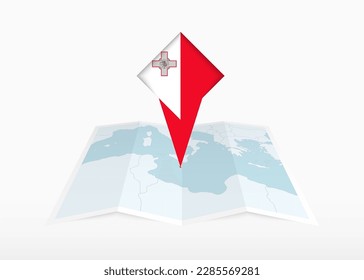 Malta is depicted on a folded paper map and pinned location marker with flag of Malta. Folded vector map.