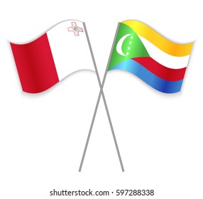 Maltese and Comoran crossed flags. Malta combined with Comoros isolated on white. Language learning, international business or travel concept.