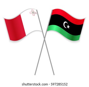 Maltese and Libyan crossed flags. Malta combined with Libya isolated on white. Language learning, international business or travel concept.