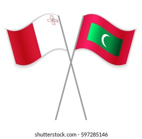 Maltese and Maldivian crossed flags. Malta combined with Maldives isolated on white. Language learning, international business or travel concept.