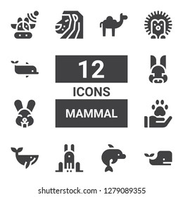 mammal icon set. Collection of 12 filled mammal icons included Whale, Dolphin, Rabbit, Pawprint, Lion, Hedgehog, Cows, Camel