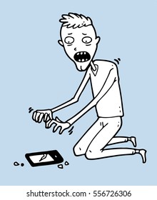 Man accidentally dropped on the ground his new expensive smartphone with fragile display and now sits in frustration over it with trembling hands and looks at the broken screen with big crack on it