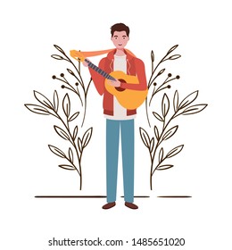 man with acoustic guitar and branches and leaves in the background