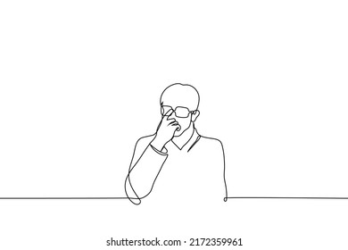 man adjusting glasses on his eyes - one line drawing vector. concept to think, reflect, falling glasses, weak spectacle frame