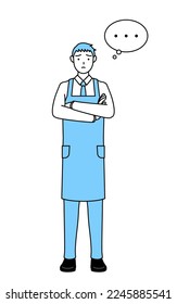 A man in an apron, arms crossed, thinking.