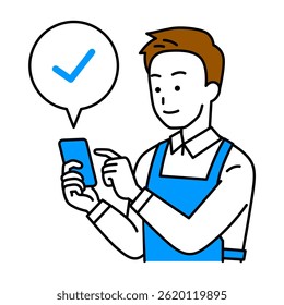 Man in an apron checking his smartphone