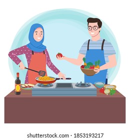 A man with apron helping and handing a vegetable to a woman with hijab and they are cooking in the kitchen