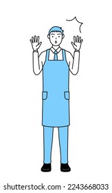 A man in an apron raising his hand in surprise.