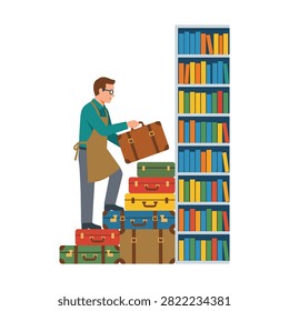 Man in an apron standing on a stack of colorful suitcases and holding a luggage bag next to a large bookshelf filled with books