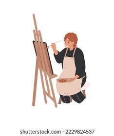 Man Artist painting picture on easel. Painter with paint palette and brush working. Hobby, painting, art studio, art classes, workshop concept.