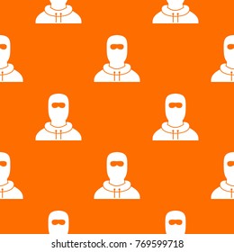 Man in balaclava pattern repeat seamless in orange color for any design. Vector geometric illustration