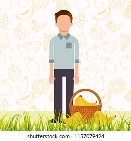 man with basket full banana in the grass