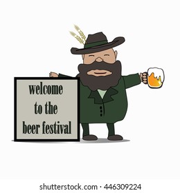 A man with a beard holds a mug of beer in his hand. Holiday concept. Beer Festival. 