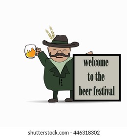 A man with a beard holds a mug of beer in his hand. Holiday concept. Beer Festival.