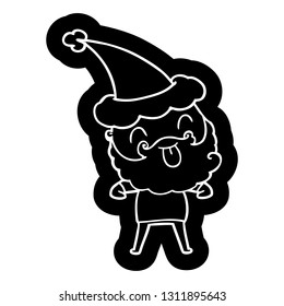 man with beard sticking out tongue wearing santa hat