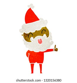 man with beard sticking out tongue wearing santa hat