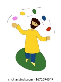 Man with a beard in a yellow sweater and blue trousers juggles Easter eggs and smiles.