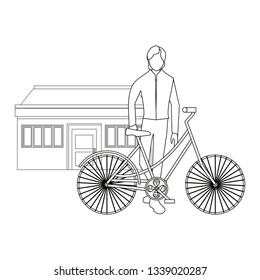 man with bike and house
